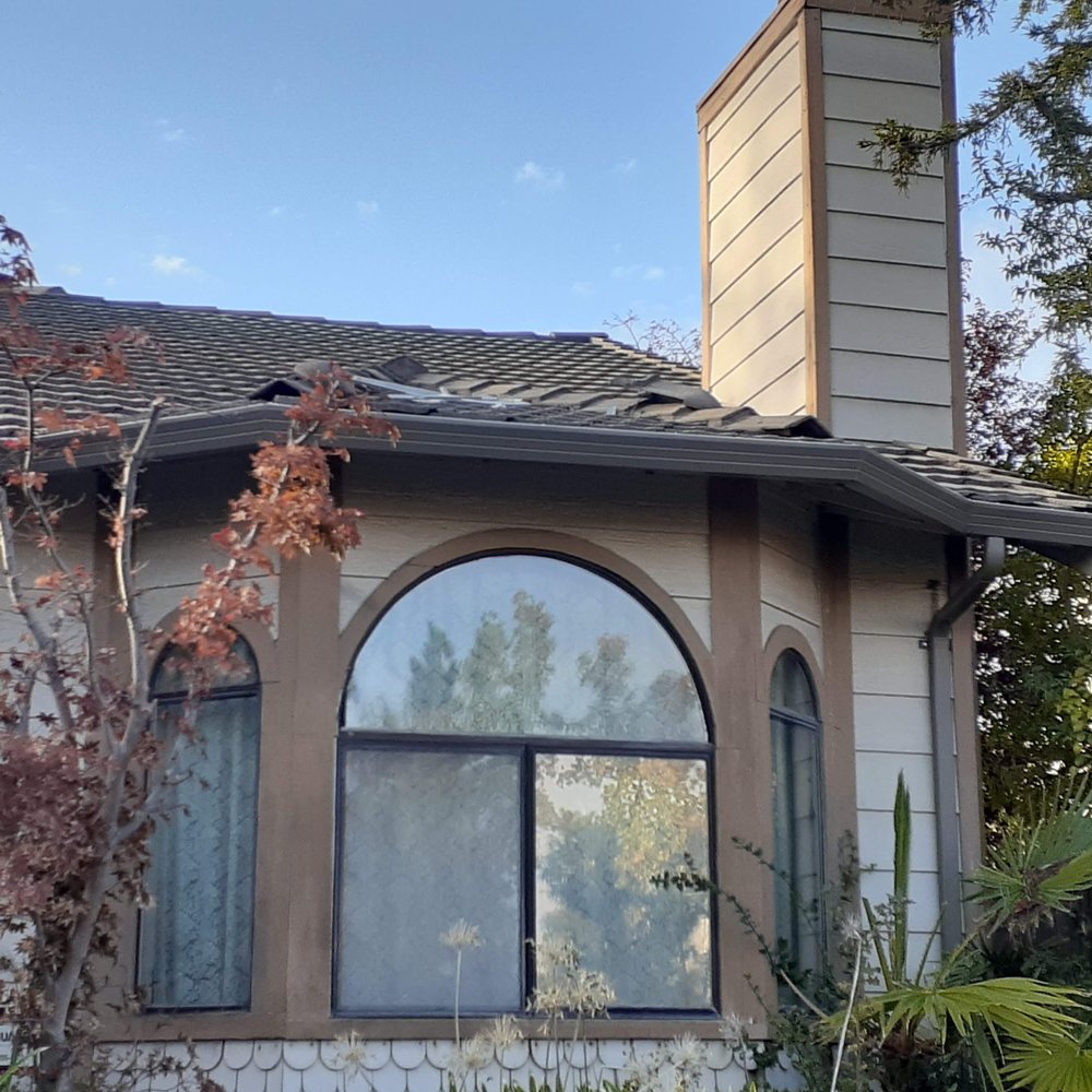 Slide of JB Rain Gutter installation