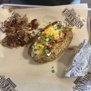 Billy Sims BBQ - Loaded potato is awesome - Barbeque Near Me - Edmond, Oklahoma Billy Sims BBQ - Loaded potato is awesome - Barbeque Near Me - Edmond, Oklahoma