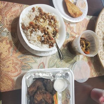 Zona Caribbean - Ox Tails, rice & Red beans,  Beef Empanadas but their Jamaican beef patties are better,  and Jerk chix. Jerk chix spicy!! - Caribbean Near Me - Norcross, Georgia