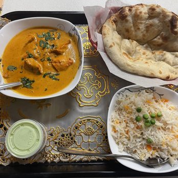 Food Flame - a plate of food with rice, bread, and a bowl of soup - Pakistani Near Me - Alexandria, Virginia Food Flame - a plate of food with rice, bread, and a bowl of soup - Pakistani Near Me - Alexandria, Virginia