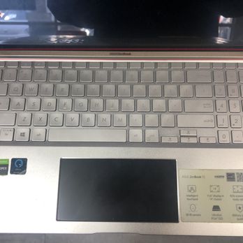 uBreakiFix - Interior of laptop prior to service showing no protrusion/deformation - Electronics Repair Near Me - Phoenix, Arizona