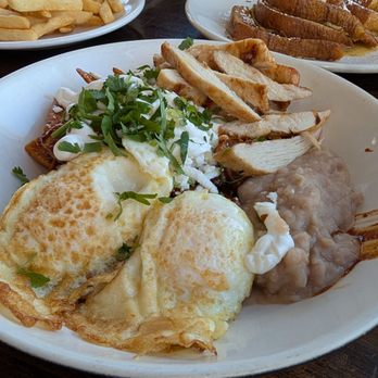 Papas and Eggs - Mole Chilaquiles with eggs - Breakfast & Brunch Near Me - Mountain View, California Papas and Eggs - Mole Chilaquiles with eggs - Breakfast & Brunch Near Me - Mountain View, California