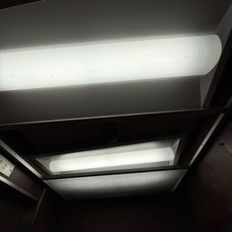 Dangerous and falling light fixture in the elevator