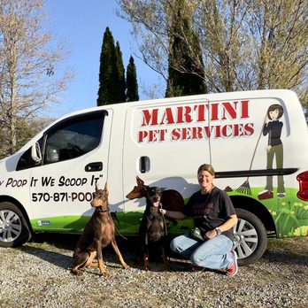 Martini Pet Services - The mascots and owner in front of our main scoop van - Pet Services Near Me Martini Pet Services - The mascots and owner in front of our main scoop van - Pet Services Near Me