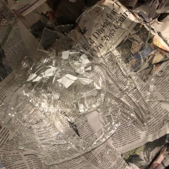 Marc's Labor & Moving Solutions - The fragile glass dishes were broken as a result of smashing the container they were in due to them standing on the crates and carelessness - Movers Near Me Marc's Labor & Moving Solutions - The fragile glass dishes were broken as a result of smashing the container they were in due to them standing on the crates and carelessness - Movers Near Me