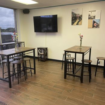 Kulture Kafe - Seating area. Coffee beans in epoxy in the floor. How cool is that. - Bagels Near Me - San Antonio, Texas Kulture Kafe - Seating area. Coffee beans in epoxy in the floor. How cool is that. - Bagels Near Me - San Antonio, Texas