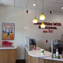 a smoothie counter and a smoothie bar