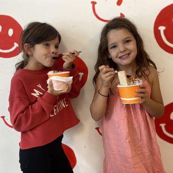Frozo - two young girls eating ice cream - Ice Cream & Frozen Yogurt Near Me - Flowery Branch, Georgia Frozo - two young girls eating ice cream - Ice Cream & Frozen Yogurt Near Me - Flowery Branch, Georgia