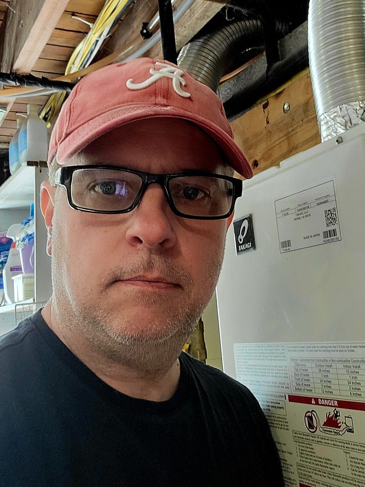 Slide of JD The Handyman