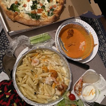 Franco's Pizza - a variety of food items on a table - Pizza Near Me - Philadelphia, Pennsylvania