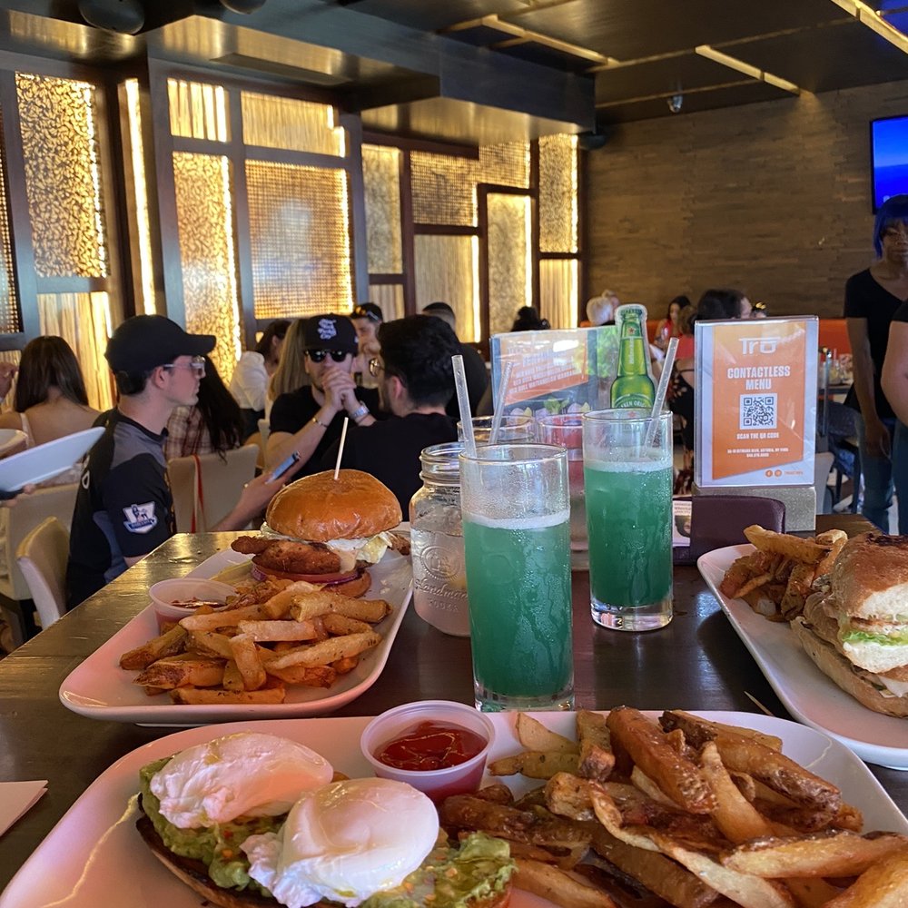 Tru Astoria - two plates of food on a table - Mediterranean Near Me - Astoria, New York Tru Astoria - two plates of food on a table - Mediterranean Near Me - Astoria, New York