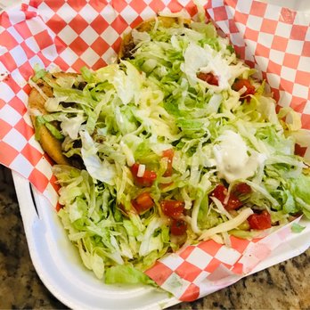 Taco Amigo - Under all that lettuce are three steak sopes - Tacos Near Me - Zephyrhills, Florida Taco Amigo - Under all that lettuce are three steak sopes - Tacos Near Me - Zephyrhills, Florida