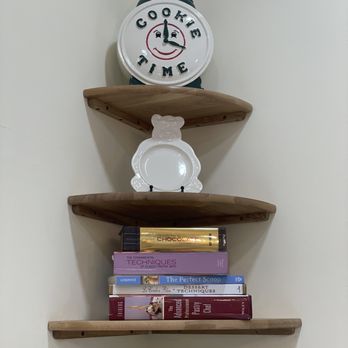 Perfect Sweets in Auburndale - a stack of books and a clock - Desserts Near Me - Queens, New York Perfect Sweets in Auburndale - a stack of books and a clock - Desserts Near Me - Queens, New York