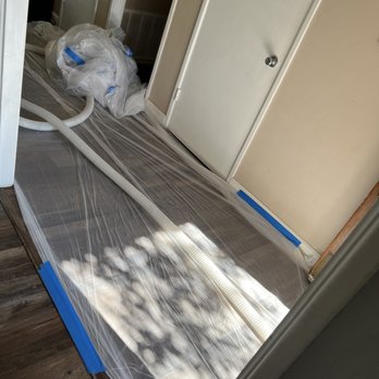Phoenix insulation - Walkway covered in plastic. - Insulation Installation Near Me