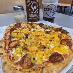 Azzip Pizza - Founder Pizza in 11" glory! Sriracha on deck!