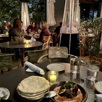 The Peacock - Patio seating with heaters - Mediterranean Near Me - Austin, Texas The Peacock - Patio seating with heaters - Mediterranean Near Me - Austin, Texas