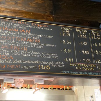 Donair Land - a menu on the wall of a restaurant - Indian Near Me - Vancouver, British Columbia Donair Land - a menu on the wall of a restaurant - Indian Near Me - Vancouver, British Columbia