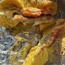 Stuff A Bagel - Sausage, egg, and cheese with ketchup on an egg everything bagel
