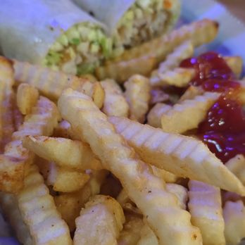 Bud's Tavern - Fries with fish wrap in the back - Bars Near Me - Louisville, Kentucky