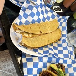 El Huarache Loco - Machetes (corn quesadillas), tacos, homemade guacamole, and delicious beans!