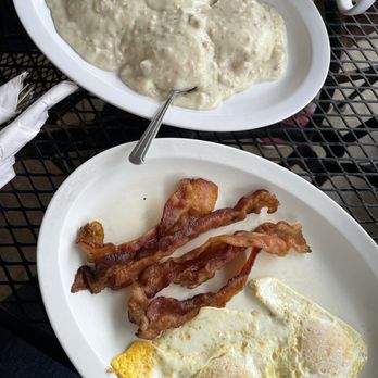Christo's Cafe - Biscuits and gravy, eggs over medium, and bacon - Breakfast & Brunch Near Me - Orlando, Florida