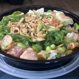 Poké bowl with three scoop of protein, two servings of salmon and one of tuna  I go there at least twice a week. Yummy