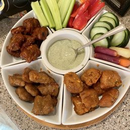 Trio of wings and the best dill ranch dressing! I added the veggies Trio of wings and the best dill ranch dressing! I added the veggies