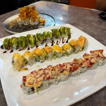 A Sushi and Grill - Front to back - N2 Red Gem, N3 Yuzu Inferno, 88. Green Dragon Roll, 92. Popcorn Lobster Roll; Follow me @RimyEats on Instagram - Sushi Bars Near Me - Tempe, Arizona