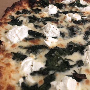 Pizzoodles - White pizza, spinach, garlic purée and ricotta. - Italian Near Me - Vero Beach, Florida Pizzoodles - White pizza, spinach, garlic purée and ricotta. - Italian Near Me - Vero Beach, Florida