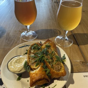 Broad Leaf Brewery & Spirits - Enchilada egg rolls.  It's 2 egg rolls cut into 4 pieces. - Beer Bar Near Me - Kentwood, Michigan