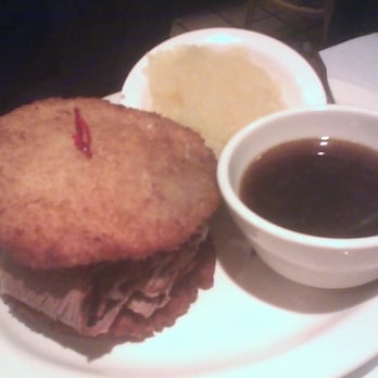 Junior's Restaurant - Something Different: potato pancakes squeezing beef brisket, sidled alongside applesauce & au jus - Bakeries Near Me - Brooklyn, New York Junior's Restaurant - Something Different: potato pancakes squeezing beef brisket, sidled alongside applesauce & au jus - Bakeries Near Me - Brooklyn, New York