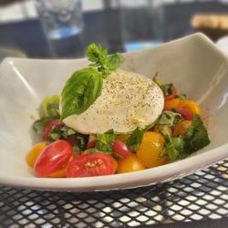 Paisano's Italian Kitchen - Burrata salad with tomatoes and basil