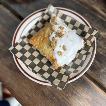 Pine State Biscuits - French toast pop tart: white chocolate bread pudding + pear compote, topped with pear glaze + white chocolate oat crumble = $5.00 - Breakfast & Brunch Near Me - Portland, Oregon