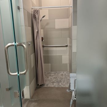 The M.A.C. Xtreme - Woman's shower stall - Gyms Near Me - Cedar Rapids, Iowa