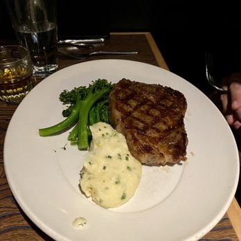 Harbor Lights - Ribeye, mashed potatoes and broccolini. The plating isn't that pretty considering the price is $59 but the flavor makes up for that. - Seafood Near Me - Tacoma, Washington Harbor Lights - Ribeye, mashed potatoes and broccolini. The plating isn't that pretty considering the price is $59 but the flavor makes up for that. - Seafood Near Me - Tacoma, Washington