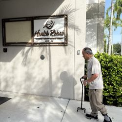 Health Rehab Plus - Dad walking into the rehab