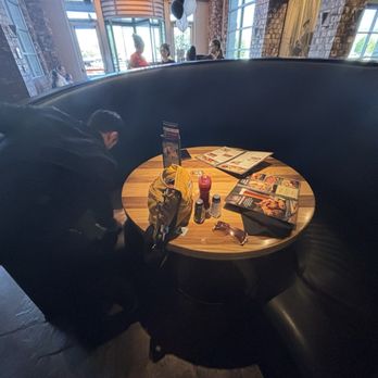 BJ's Restaurant & Brewhouse - The bus boy reclining the booth - New American Near Me - Palmdale, California BJ's Restaurant & Brewhouse - The bus boy reclining the booth - New American Near Me - Palmdale, California