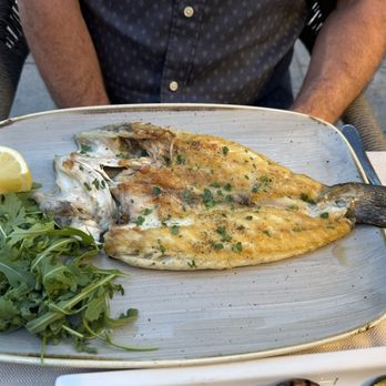 Garden Bistrot - Whole grilled sea bream, with arugula. - Italian Near Me - Venezia, VE