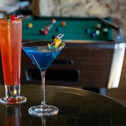 Ballers Bar and Grill - Drinks in game room with pool table, cocktails.