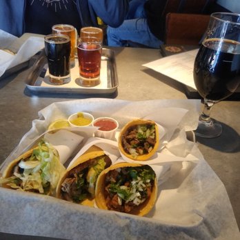 La Reforma Brewery - Tacos!!! And a beer flight in the background. - Breweries Near Me - Albuquerque, New Mexico