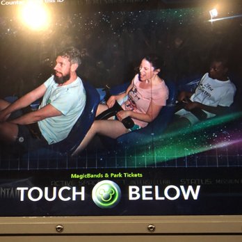 Space Mountain - Screen shot picture of me and my husband (pictured in the front of the ride) and that's me in the middle with the pink Mickey Mouse shirt. - Amusement Parks Near Me - Lake Buena Vista, Florida Space Mountain - Screen shot picture of me and my husband (pictured in the front of the ride) and that's me in the middle with the pink Mickey Mouse shirt. - Amusement Parks Near Me - Lake Buena Vista, Florida