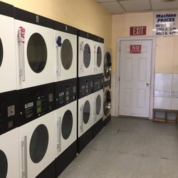 Tommy's Laundromat - Dryers and large washers at the end of the laundromat