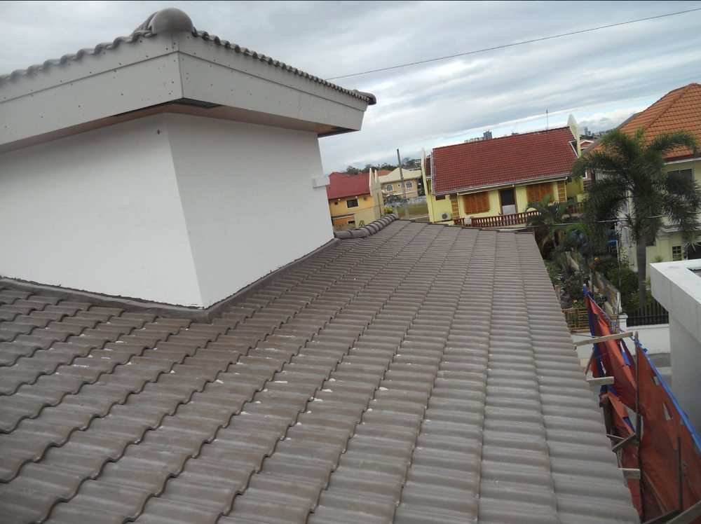 Slide of Progressive Roofing