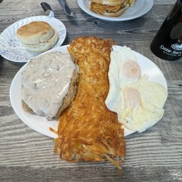 Chicken fried steak and breakfast sandwich. Chicken fried steak and breakfast sandwich.