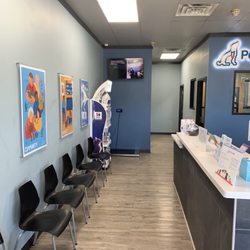 PetWellClinic - West Hills - Plenty of seating in the waiting area by the front desk.
