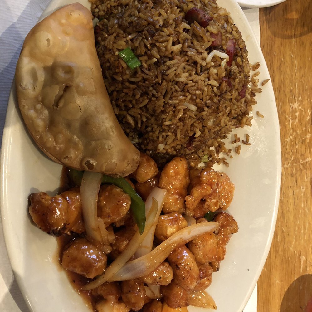 Sweet and sour chicken with pork fried rice and vegetable pastelito. Sweet and sour chicken with pork fried rice and vegetable pastelito.