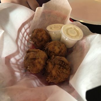 Pop Top Burgers - Popper topper cheese balls. Deep fried balls of cream cheese, cheddar, bacon, and jalapeño. Served with ranch. - Burgers Near Me - Webster, Texas