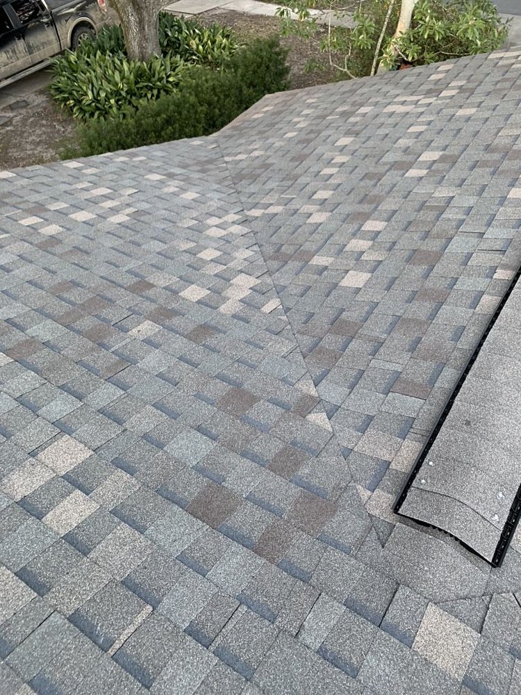 Slide of Pelican Roofing Company