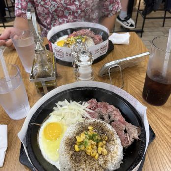 Pepper Lunch - Beef pepper rice (added an egg and onions) - Teppanyaki Near Me - Honolulu, Hawaii Pepper Lunch - Beef pepper rice (added an egg and onions) - Teppanyaki Near Me - Honolulu, Hawaii