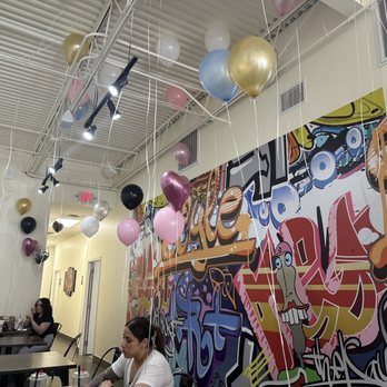 Hella Bubble - a group of people sitting in a room - Bubble Tea Near Me - Kingwood , Texas